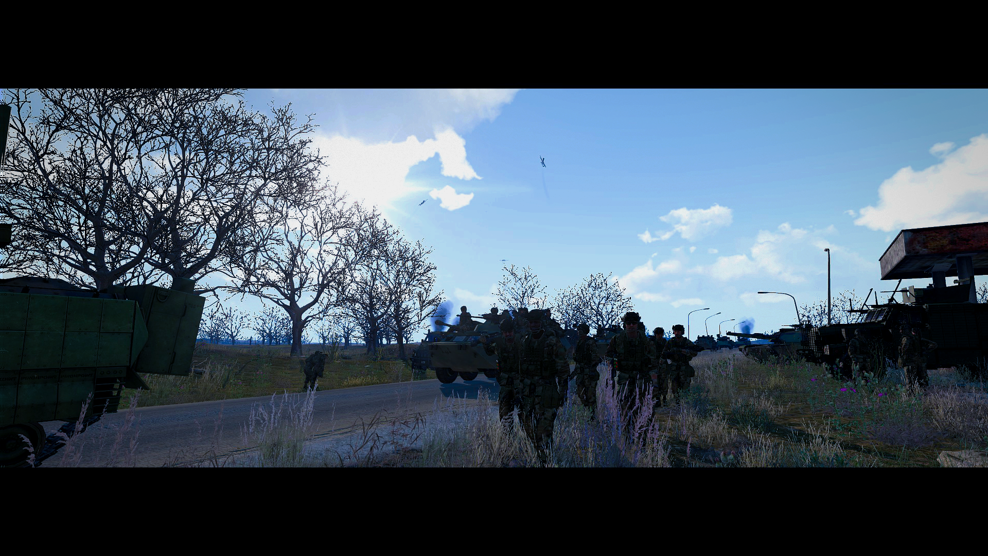 Infantry advancing along a road beside armored vehicles, with aircraft overhead in Arma 3.