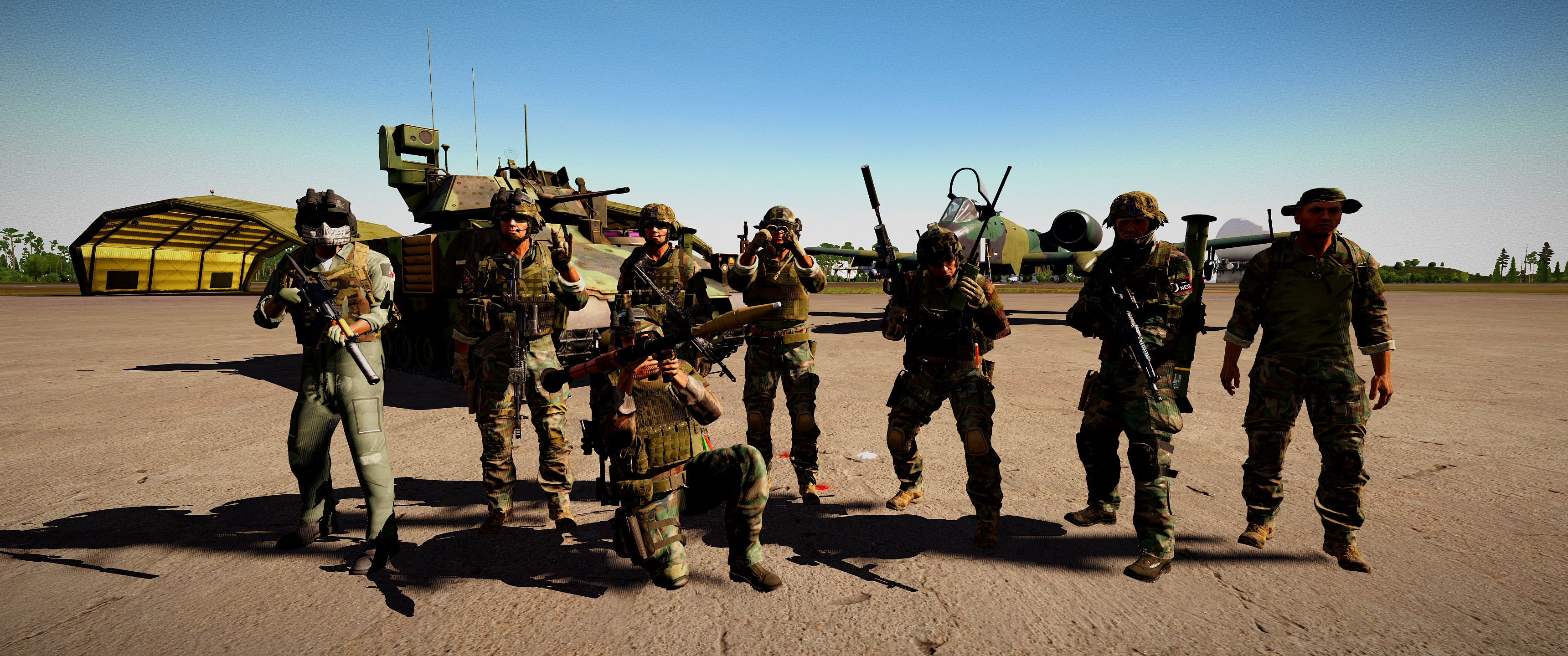 Kodiak members posing together on an Arma 3 airfield, with an armored vehicle and jet behind them.