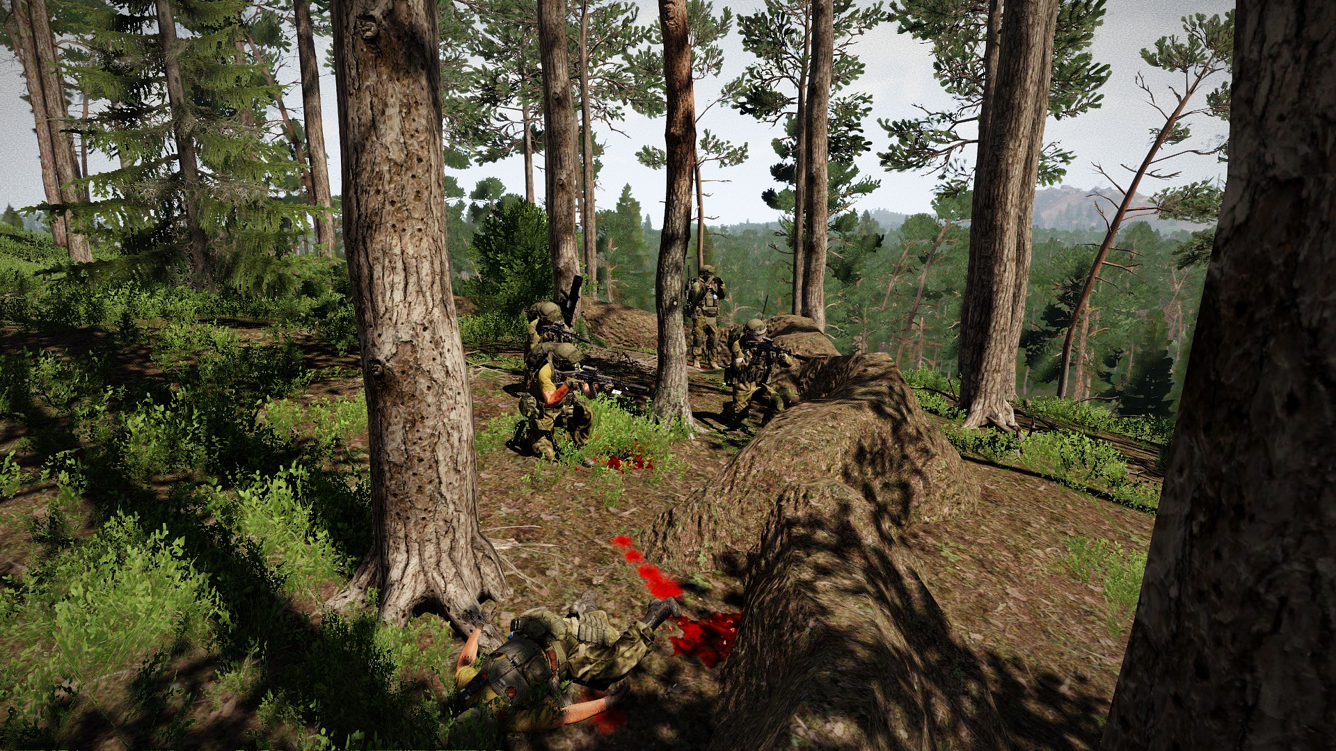 An Arma 3 squad taking cover among pine trees and rocks, with a downed teammate in the foreground.